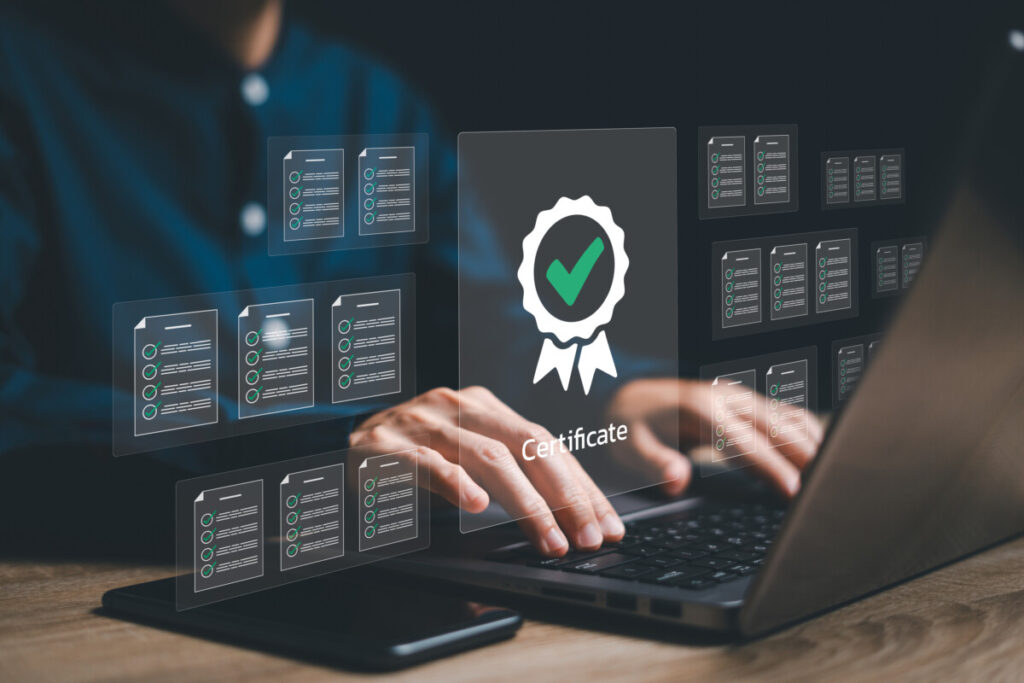 Business work and Assessment for the certificate concept, Women use a laptop evaluation online survey exam on e-document and choose the right answer in the exam on international standard certification